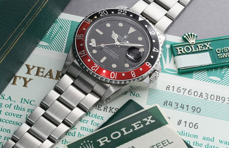 解密古董劳力士手表保证书上的密码资讯