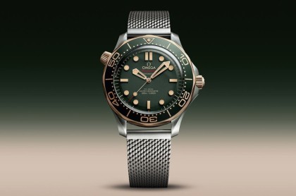 欧米茄海马潜水300米改钛金属表壳与绿面 再用青铜金表圈形成双色效果